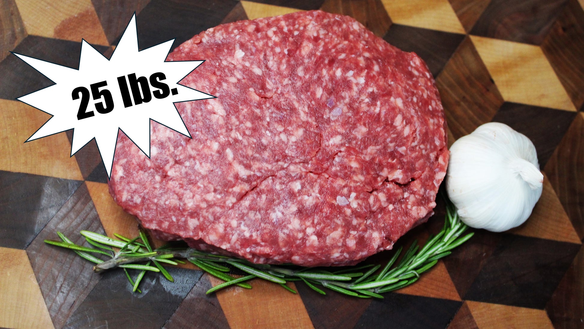 Raw ground meat on a wooden cutting board with rosemary and garlic, labeled '25 lbs.'